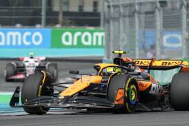 McLaren driver Lando Norris on the way to his maiden Formula One grand prix victory in Miami. (AP PHOTO)