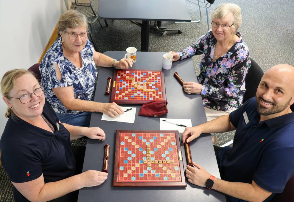 Singleton Public Library Programs Officer Karen Miller, Scrabble Club members Mavis Hardy and Betty Price, and Singleton Council Community Development Officer Mathew Fox. Picture supplied 