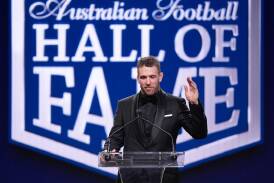 Collingwood legend Dane Swan at the podium after being inducted into the Hall of Fame. (Daniel Pockett/AAP PHOTOS)