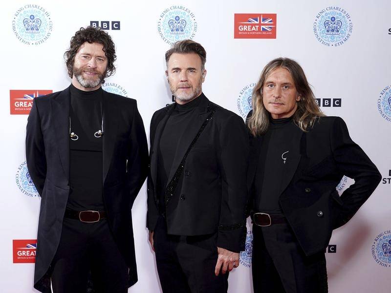 Take That (from left): Howard Donald, Gary Barlow and Mark Owen are set to tour the UK and Ireland. (AP PHOTO)