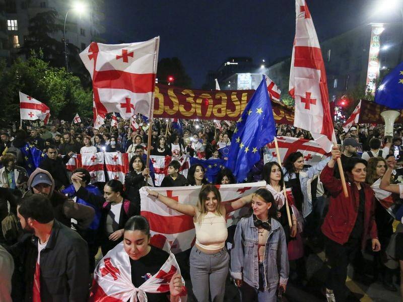 Georgian protesters have rallied for weeks against what opponents denounce as ""the Russian law". (AP PHOTO)