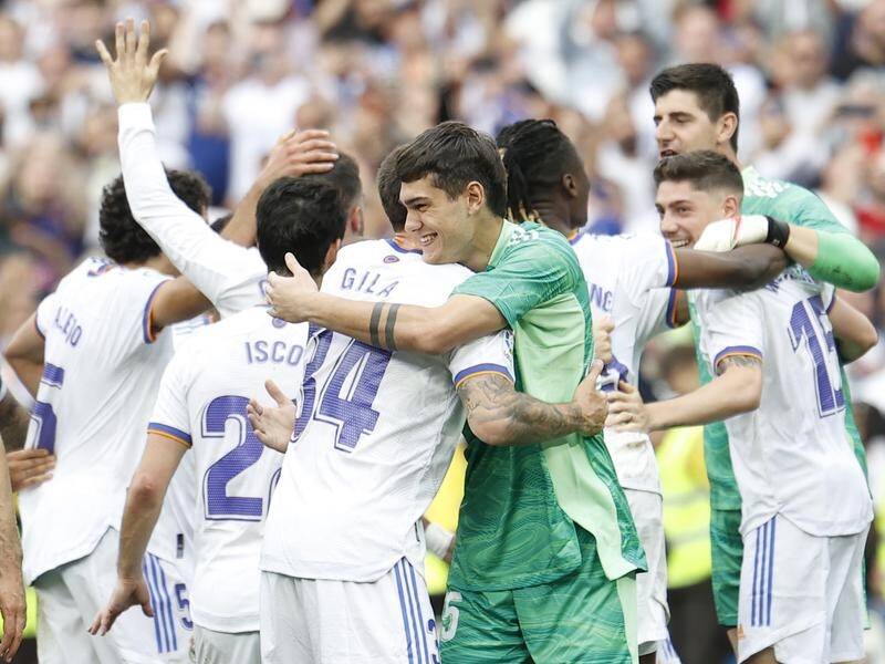 Real Madrid's players celebrate winning LaLiga after their 4-0 win over Espanyol.